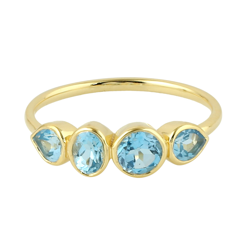 Bezel Set Blue Topaz Four Stone Design Band Ring In 14K Yellow Gold