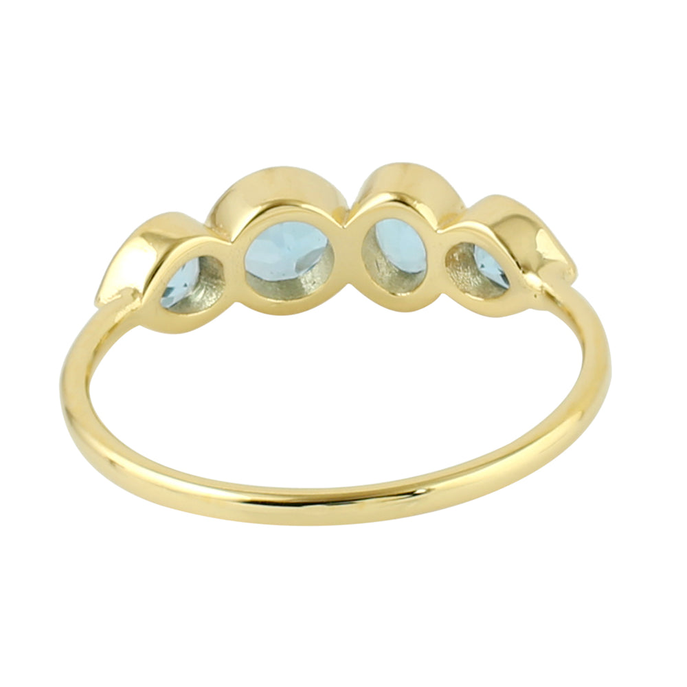 Bezel Set Blue Topaz Four Stone Design Band Ring In 14K Yellow Gold